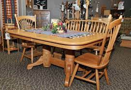 This large double pedestal table is displayed in 48″ x 66″ and can extend up to 102″ with its 3 leaves (although, you can order yours to the size that fits your family's needs). Amish Dining Set 030 The Amish Connection Solid Wood Furniture Albuquerque