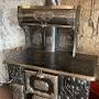 Antique wood burning stove from www.pinterest.com