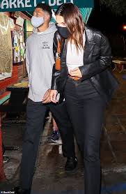 The model was pictured laying underneath booker. Kendall Jenner Dons Date Night Look To Grab Dinner With Beau Devin Booker In West Hollywood Daily Mail Online