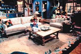The living room has large windows and an interesting design. Separating Your Living Room And Dining Room Frances Hunt