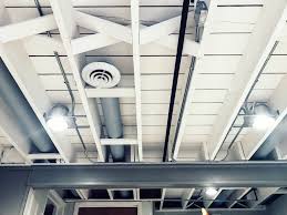 However, a black ceiling can make a space feel a little more cozier because it allows the furnishings to stand out and the dark ceiling allows the space to blend. Diy Painted Basement Ceiling Project First Thyme Mom Basement Ceiling Ideas Cheap Diy Basement Basement Renovations