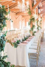 Rustic Elegant Wedding Reception Decor Long Table With White Table Linens Greene Rustic Elegant Wedding Rustic Wedding Reception Elegant Wedding Reception