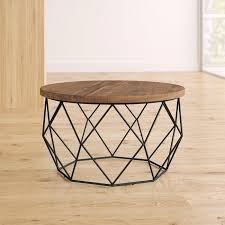A tall, round cocktail table with a wrought iron frame and an antique look. Deion Frame Coffee Table In 2021 Coffee Table Contemporary Coffee Table Cool Coffee Tables