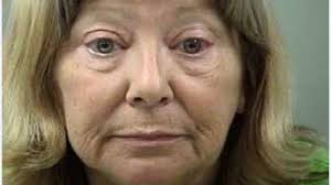 Woman accused of hiring carnival worker to kill son, daughter-in-law