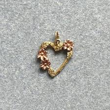 10k gold will tarnish faster then 14k, 18k, 24k but 10k is more durable then all the higher karats. 1980s Heart In Black Hills Gold By Stamper Co Gem