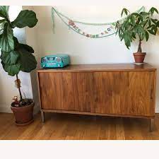 Scandi design, cb2 mercer credenza is made of rotary cut walnut veneer in a rich midtone stain. Cb2 Mercer Credenza Aptdeco