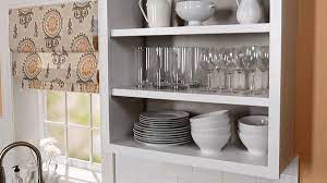 Standard kitchen wall cabinets have solid doors, for the primary reason of hiding the contents inside. How To Convert Kitchen Cabinets To Open Shelving Better Homes Gardens