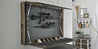 If wall space is limited or you're working with a small entryway, a coat hanger stand might be the best option to keep things organized. Secret Diy Gun Compartment Hides Behind A Mirror