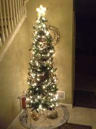 7ft Pencil Style Tree In Entryway Love The Ivory Silver And Gold Pencil Christmas Tree Skinny Christmas Tree Christmas Tree Crafts
