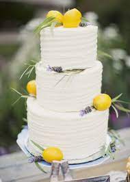 Editor S Picks Brilliant Yellow Wedding Ideas Full Of Cheer Modwedding Lavender Wedding Cake Lemon Wedding Cakes Tiered Wedding Cake