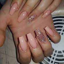 This fancy nail design you might be able to achieve on your own at home with minimal trouble. Peachy Nails With Rose Gold Glitter Nail Art Gold Glitter Nails Rose Gold Nails Glitter Gold Nails