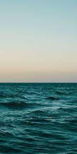 Adorable Sea Calm Surface Body Of Water Sunset Wallpaper Nature Iphone Wallpaper Sunset Wallpaper Ocean Wallpaper