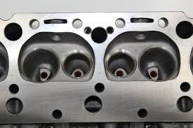 Undercut valves create unwanted turbulence and a decrease in intake charge velocity (they add volume (slowing the gases) to the overall port volume just behind the valve. Engine Quest Ch350i Cylinder Heads Brzezinski Racing Products