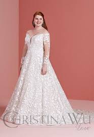 A wedding dress with beaded detail and a long tulle train that'll have your s.o. Plus Size Wedding Dresses Gowns For Curvy Brides Love It At Stellas