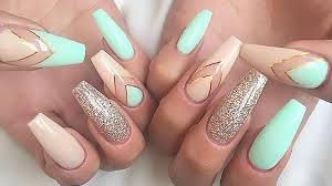 White triangles pop against darker colors making this one of our favorite simple yet colorful nail designs for short nails. 20 Best Coffin Shape Nail Designs In 2021 The Trend Spotter