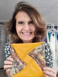 Optical illusion quilt with double meander stitch