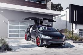 Custom Satin Black Tesla Model X With Mx114 22 Inch Forged Wheels In Imperial Red By T Sportline Tesla Model X Tesla Model Tesla Sports Car