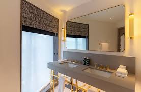 Freestanding baths have a timeless appeal, bringing an element of theatre to your bathroom. Hart Shoreditch London Curio Collection By Hilton