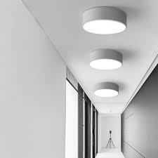 The pendants use a photographer's trick to maximize light: Bright Kitchen Lighting Flush Mount Online