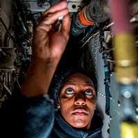 An employee of the Asadabad Demonstration Farm and