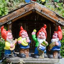 11 Tacky Lawn Ornaments That Need To Stay In Storage Gnome Garden Fairy Garden Diy Lawn Ornaments