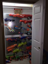 Used various hooks, wood screws, and nails to mount the guns. Pin On Nerf Gun Rack