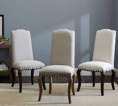 Upholstered dining chairs give you extra comfort that adds to your enjoyment at the table. Calais Upholstered Dining Chair Pottery Barn