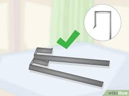 With a hardened nail or tile scoring. 3 Ways To Hang A Door Mirror Wikihow