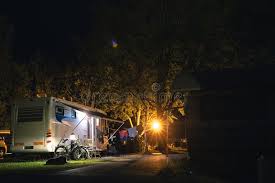 Yellowstone national park lodges provides reservations for. Night View Of The Parking Lot For A Motorhome Camper Van Campsite Camp For Sleeping And Relaxing Vacation And Travel Tour Stock Photo Image Of Parking Alps 163473000
