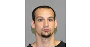 Police release image of man wanted for Oshawa stabbings