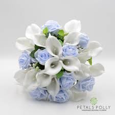 Maybe you would like to learn more about one of these? Baby Blue Rose White Calla Lily Brides Posy