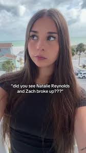 Selfie showcasing maternity style and fashion.