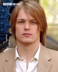 Can you spot young person in old photo?