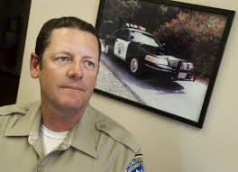 CHP officer, Good Samaritans save woman