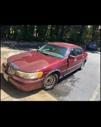 Image result for Toreador Red 1999 Town Car
