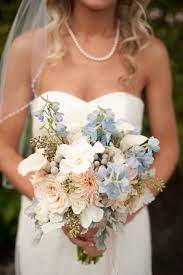 Wedding bouquet, febou handmade blue bridesmaid bouquet bridal bouquet with crystals soft ribbons, artificial rose flowers for wedding, party and church (royal blue) 4.6 out of 5 stars 4,532 $11.99 $ 11. Beach Chic Light Blue And Peach Wedding Every Last Detail Blue Wedding Bouquet Blue Peach Wedding Peach Wedding