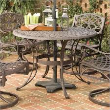 Homestyles 42 Round Outdoor Dining Table Rust Brown Finish 5555 30 Homestyles Round Outdoor Dining Table Metal Dining Table Outdoor Dining Table