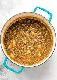 Lentil Potato Soup Recipe One Pot Nutritious Brown Lentil Soup In A Blue Dutch Oven Brown Lentil Soup Lentil Soup Recipes Soup Recipes