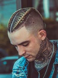 This cornrows men hairstyle combines different patterns, with some neat and clean straight rows as well as some cool wavy patterns that offset the straight rows to give you some contrast. 20 Badass Cornrow Hairstyles For Men Caymans Post