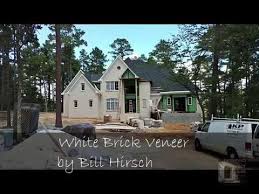 It's a classic look found in most suburbs, especially new construction, making it you can cut down on costs by using an alternative called brick veneer, which uses thin layers of brick. White Brick Veneer On Exterior Of A House Youtube
