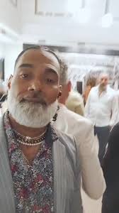 Muscle Guy with Long Beard in Braid