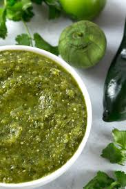 Once the skins have charred and are beginning to burst open, remove from heat source, place under a damp towel. Roasted Green Tomatillo Enchilada Sauce Borrowed Bites