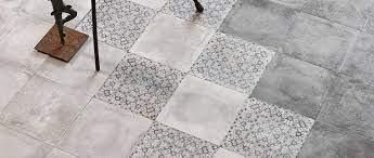 Subway tile bathroom with mosaic marble floor with a border, thebathroom has a chair rail that frames the tub area and the mirror atthe vanities. Floor Wall Tiles Brisbane Inspiring Wall Floor Tiles Metro Tiles
