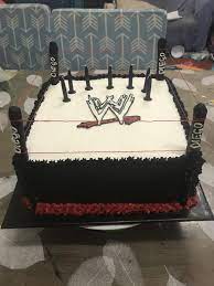 He's really into sports and so his mom asked for a football cake. Wwe Birthday Cake 7 Year Old Boy Wwe Birthday Wwe Birthday Cakes Cake