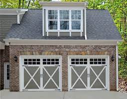 We have added a steel overhead garage door and reinforced the floor of this shed to ensure that it will handle anything you can fit through the door. Yes You Can Paint Your Garage Door To Match Your Exterior Paint Color Scheme We Love Th Garage Door Design Exterior Paint Colors For House Garage Door Colors