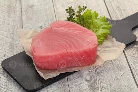 Raw tuna steak 8503714 Stock Photo at Vecteezy