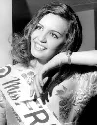 Image of Norma Parnell (20) actress & model, wearing romper outfit which