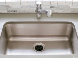 Create enough room on the counter for the new sink. How To Install A Kitchen Sink Drain