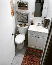Go wild with a black bear soap dispenser and shower hooks. Small Apartment Bathroom Ideas How To Make A Tiny Bathroom Pretty Moda Misfit