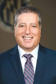 Perlozzo hired as OC's tourism director